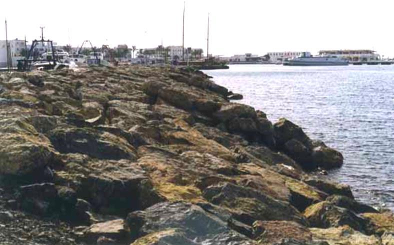 Modificación del dique de abrigo del Puerto de La Sabina, en Formentera, España Puertos de Baleares 2002 Se llevó a cabo la Dirección de Obra de la obra consistente en la reforma del manto principal