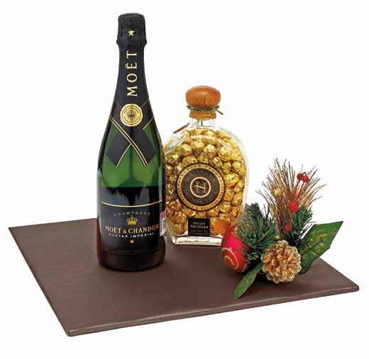 Dulce PASIÓN CLAVE 87 $1,349 1 Champagne Nectar Imperial Möet & Chandon 750 ml 1 Trufas de nuez con sotol dorado