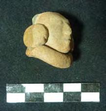 La figurilla hallada en el Área de Almacenaje es la cabeza de un felino, posiblemente un jaguar, y es probable que haya sido un instrumento musical por la