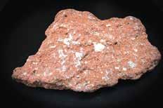 vesículas y son propios de rocas formadas en la superficie con presencia de