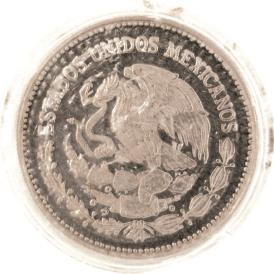 46 grms. Cobre. F. 5) 1 Real, Zacatecas, 1868, YH. Latón. F. 3000.00 MONEDA EXTRANJERA (FOREIGN COINAGE) 1073. Australia. Holey Dollar & Dump.