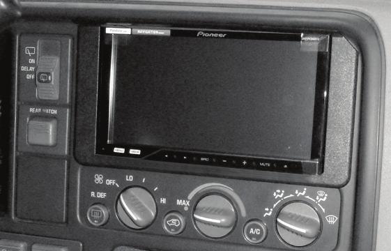 Installation instructions for part 95-3003G KIT FEATURES ISO DDIN radio provision Painted and textured to match the factory dash KIT COMPONENTS A) ISO DDIN trim panel B) Radio brackets A GM Full-Size