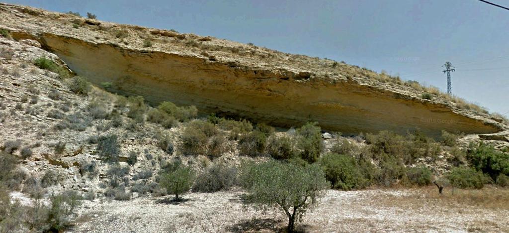 Detalle en la anterior: Balma de erosión en las areniscas del Andaluciense,