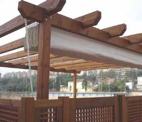 TOLDO CORREDERO PERGOLA DE MADERA CON TOLDO SOFIA Sustituye la estructura de aluminio característica del toldo Sofía por la madera, dando una imagen confortable y cálida al entorno.
