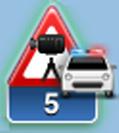 El símbolo de alerta tiene un borde de fondo verde mientras conduce a una velocidad igual o inferior al límite permitido y un borde de fondo rojo si conduce a más velocidad.