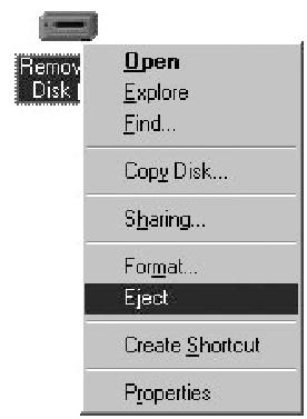 Windows 2000/Me 1. Haga clic en el icono Desconectar o retirar hardware ( ) de la barra de tareas. 2. Seleccione Stop USB Mass Storage Device del menú (Windows 2000).