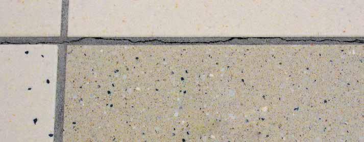 Síntoma de la lechada de cemento Grietas en la lechada Una separación o leve abertura en la junta de la lechada, que normalmente se encuentra entre el borde de la junta de lechada y el borde de la