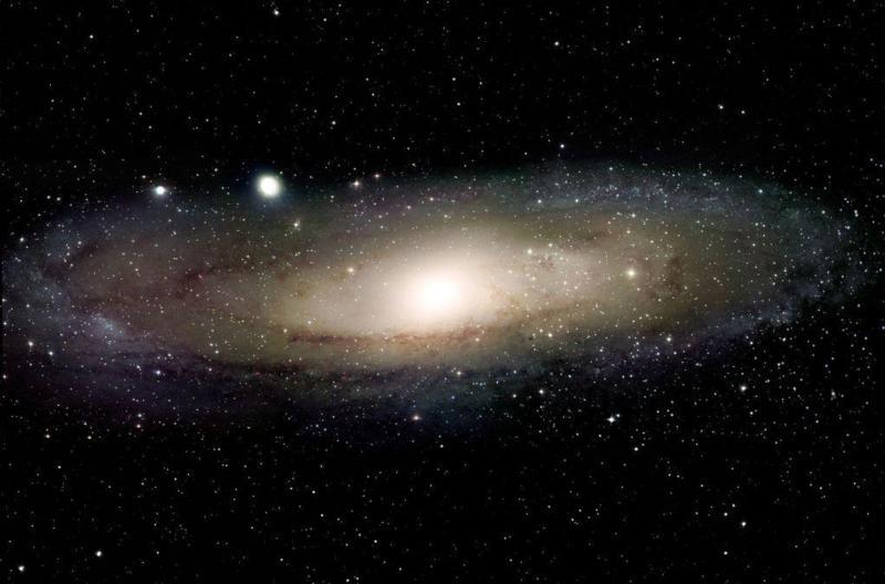Composición del Universo 1959-80 Más evidencia a favor de la materia oscura Curvas de rotación de galaxias espirales: Velocidad orbital vs.