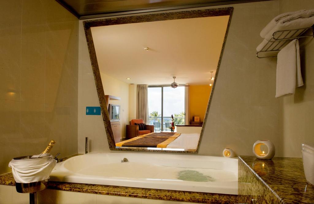 GRAND SIRENIS RIVIERA MAYA HOTEL & SPA 456 Junior Suites, todas acondicionadas con: 2 camas dobles o cama king size Ducha hidromasaje Sala de estar