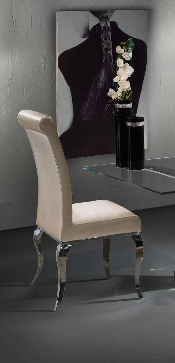 28 ISABELLA ISABELLA Mesa de comedor rectangular realizada en acero inoxidable, tapa de cristal con canto pulido, de 12 mm.