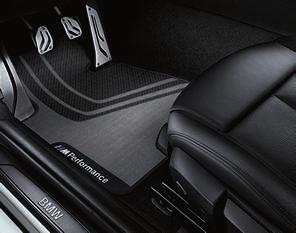 Moldura de consola central BMW M Performance con conmutador de selección en Alcántara y carbono La moldura de la consola central convence con su exclusiva combinación de materiales.
