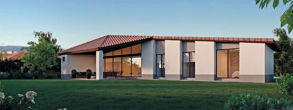 REINTERPRETAMOS LA CASA CHILENA Es una casa chilena moderna que integra detalles de la arquitectura contemporánea con símbolos tradicionales propios.