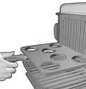 Pull out and rotate the adjustable slope lever on the back right side of the grill forward, so the grill is in the sloped position (C).