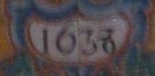 palos de gules (en referencia a la corona de Aragón); todo ello rodeado de una bordura de azur con ocho escudetes de oro fajados de azur, correspondientes al linaje navarro Vidaurre, 1 apellido