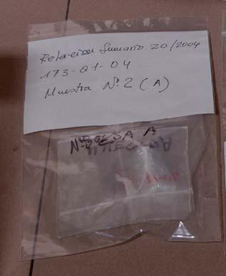 M-5-2-A Sustancia blanquecina seca dentro de un vial etiquetado 11-M 2-A, con un peso bruto de 9,0 g, envuelto en