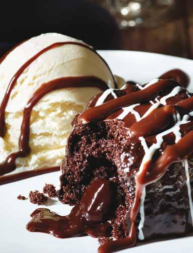 fudge brownie sundae Nuestro Fudge Brownie horneado. Servido con helado de vainilla y adornado con tiras de chocolate caliente. $159 CARROT CAKE Nuestro Fudge Brownie horneado.