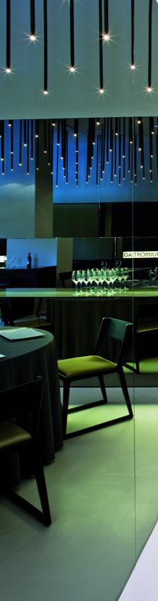 ZONA ABIERTA GASTROMIUM UN CLÁSICO MODERNO Francesc Rifé ha construido en el restaurante Gastromium un espacio perfectamente armonizado con la luz, una atmósfera cálida que quiere reproducir en el