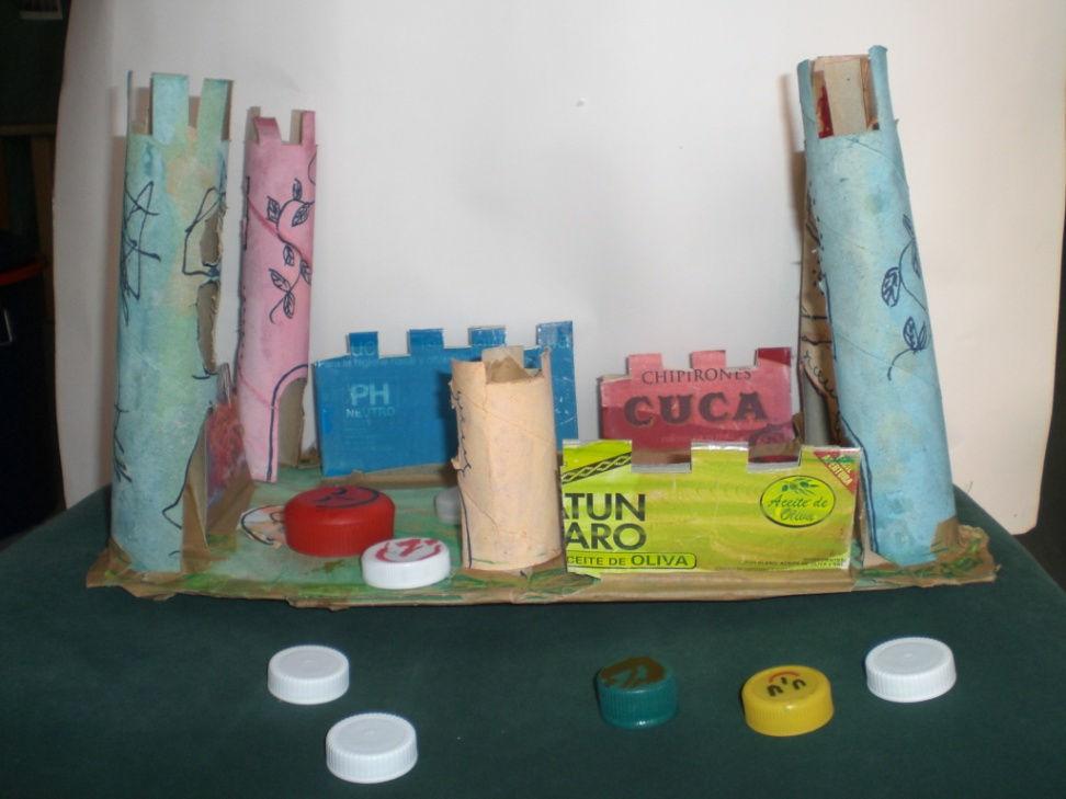 titulo Materiales: rollos de papel y envases de cartón, base de cartón, tapones, pintura.