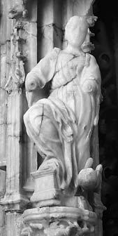 Figura de una pilastra del retablo como finalmente se talló; ni sobre el número de escenas de la parte principal, que son tres y no las cinco que se habían estipulado en la capitulación.