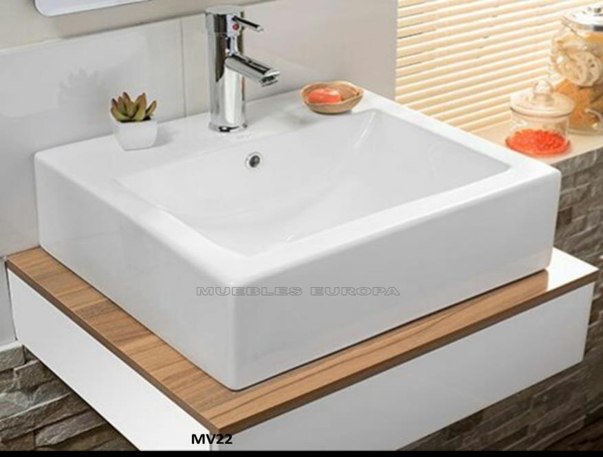 MODELO MV22: 1.- Mueble para baño de 60cm largo x 45cm fondo, combinación de color capuchino-blanco. 1.- Lavabo cerámico blanco tipo cuna de 51x41cm, fabricado en alta presión, máxima calidad.
