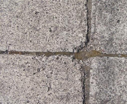 7. FRACTURAS DE ESQUINA Es la fractura de la losa aproximadamente a 0,5 m de la esquina, es diferente del agrietamiento de esquina porque las fracturas generalmente se alinean para instersecar la