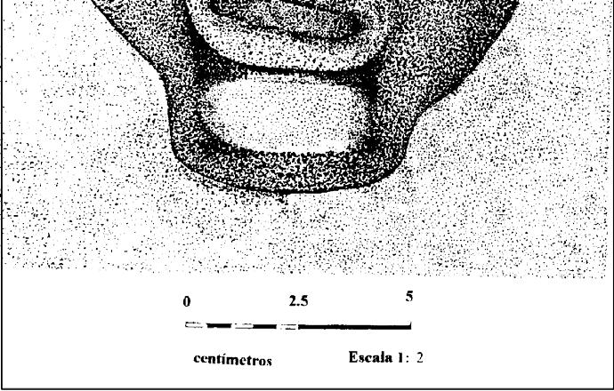 El petrograbado es un rostro esculpido en una esquina de la parte superior de la roca, el cual mira hacia arriba (0.30 m de largo por 0.25 m de ancho).