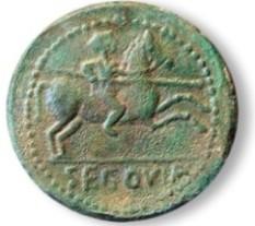 El reverso se corresponde con el de las últimas monedas de KONTERBIA KARBIKA (ACIP 1840, CNH Konterbia Karbika 12) habiendo sustituido la leyenda ibérica de KARBIKA por la de SEGOVIA empleando unos