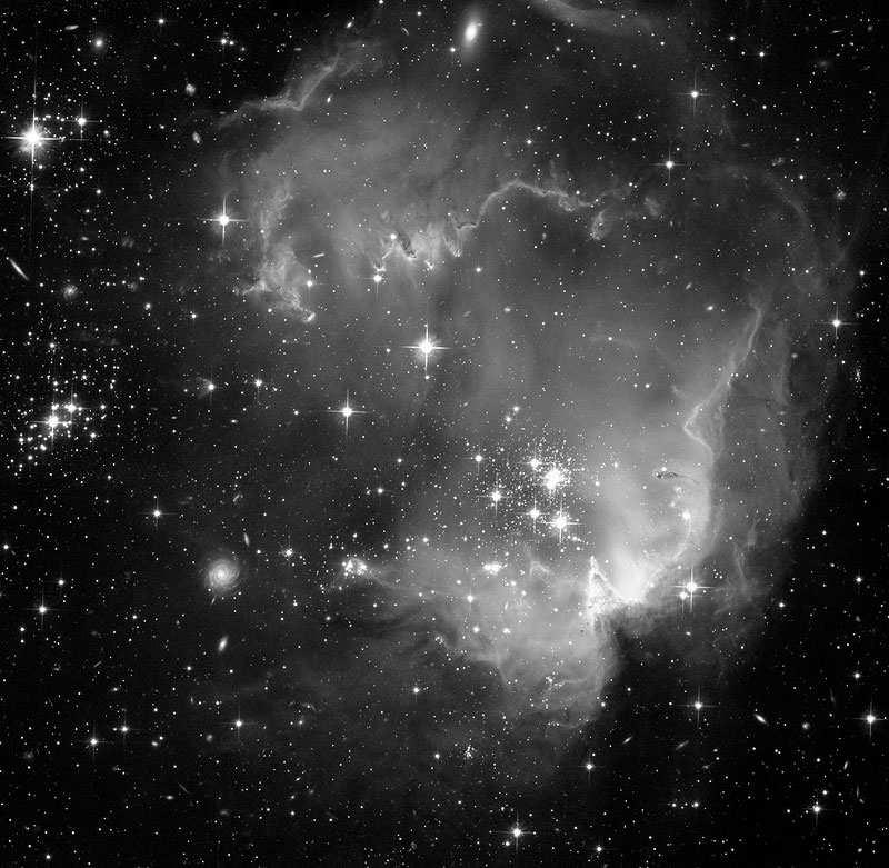 Estrellas O B Polvo Región HII Estrellas viejas Los brazos espirales que se observan en nuestra Galaxia y otras galaxias espirales son