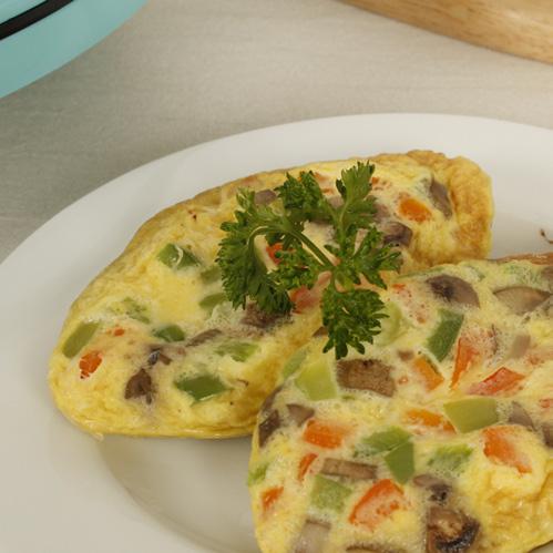 Vegetable Omelette Ingredients: 2 beaten large eggs 1/4 cup chopped red pepper 1/4 cup chopped green pepper 1/4 cup chopped mushrooms
